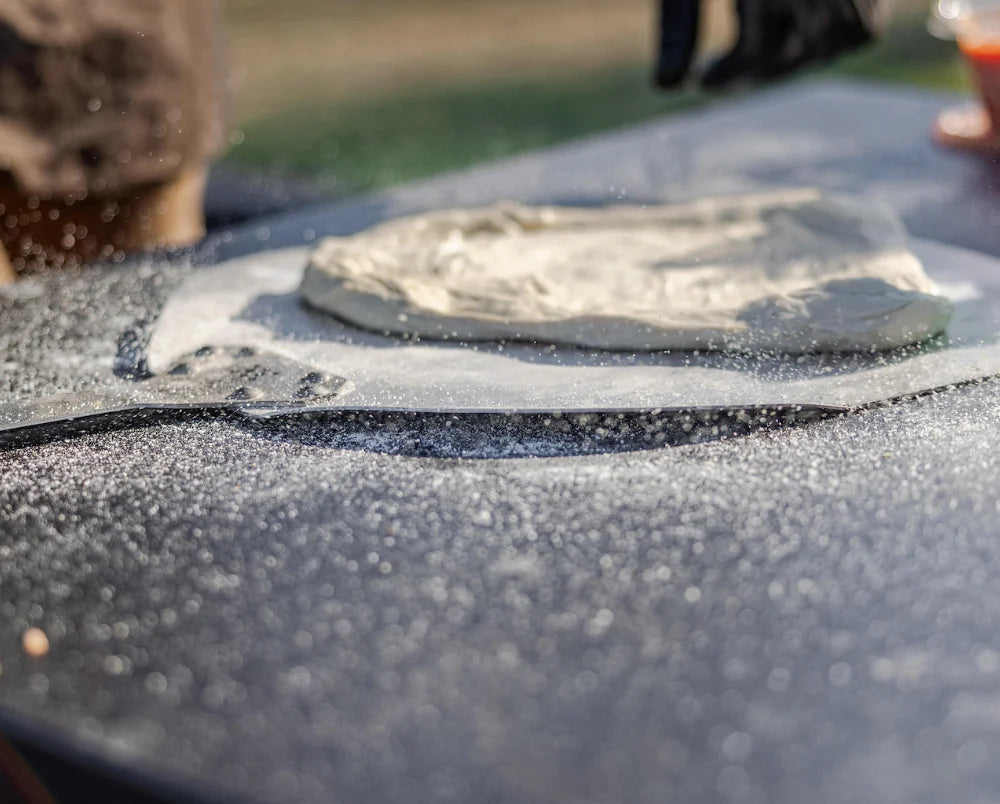 pizza dough on pizza tray