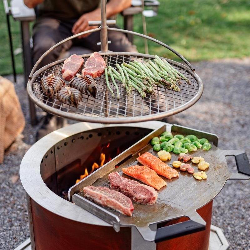 This image features the X24 firepit with an Outpost 24 and Flat Top 24