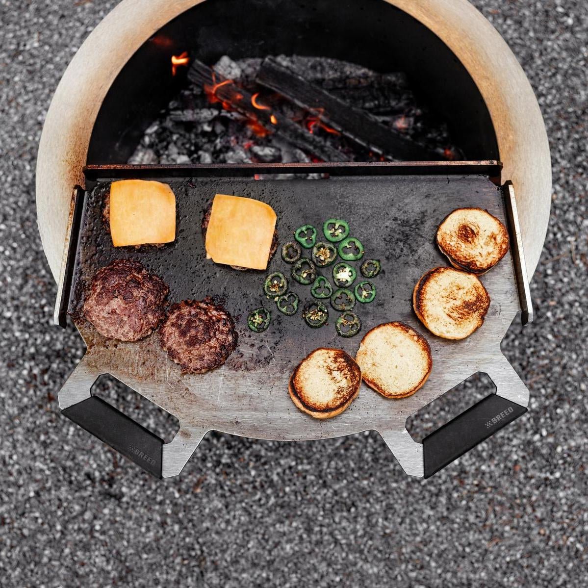 An image of the Flat Top Griddle used to grill burgers