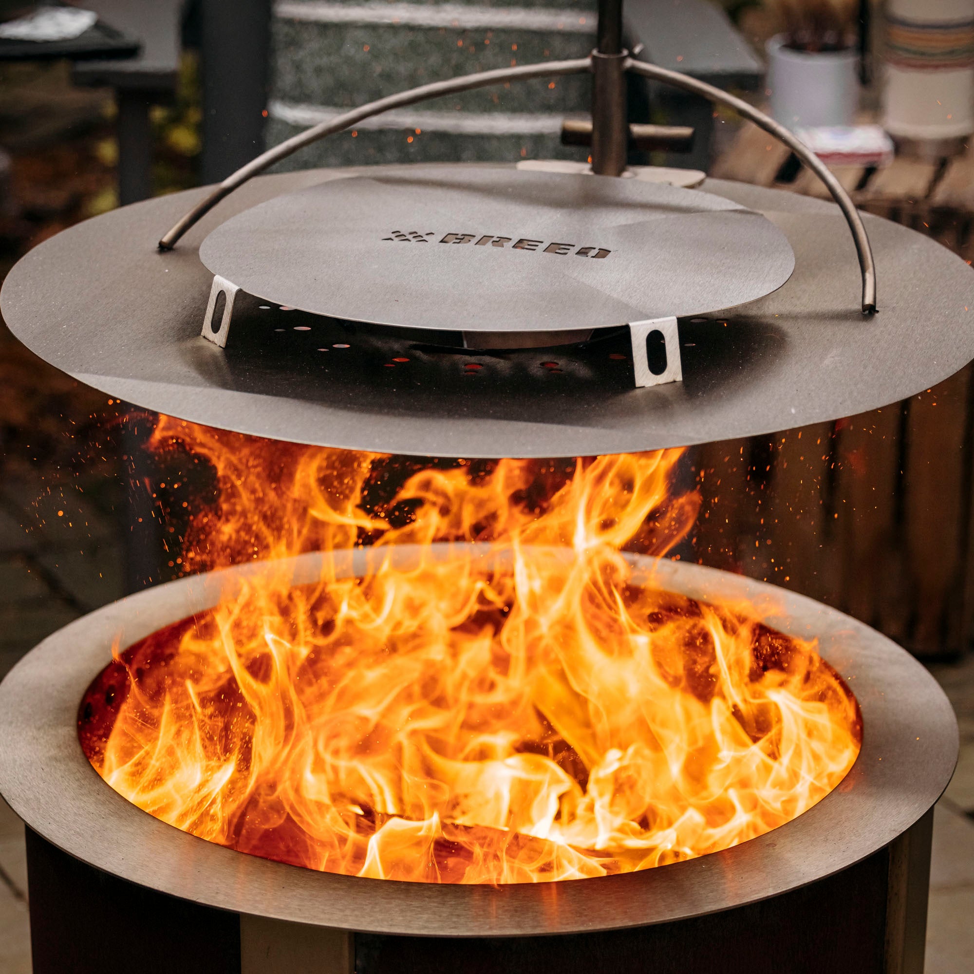 Breeo smokeless firepit with fired up close 