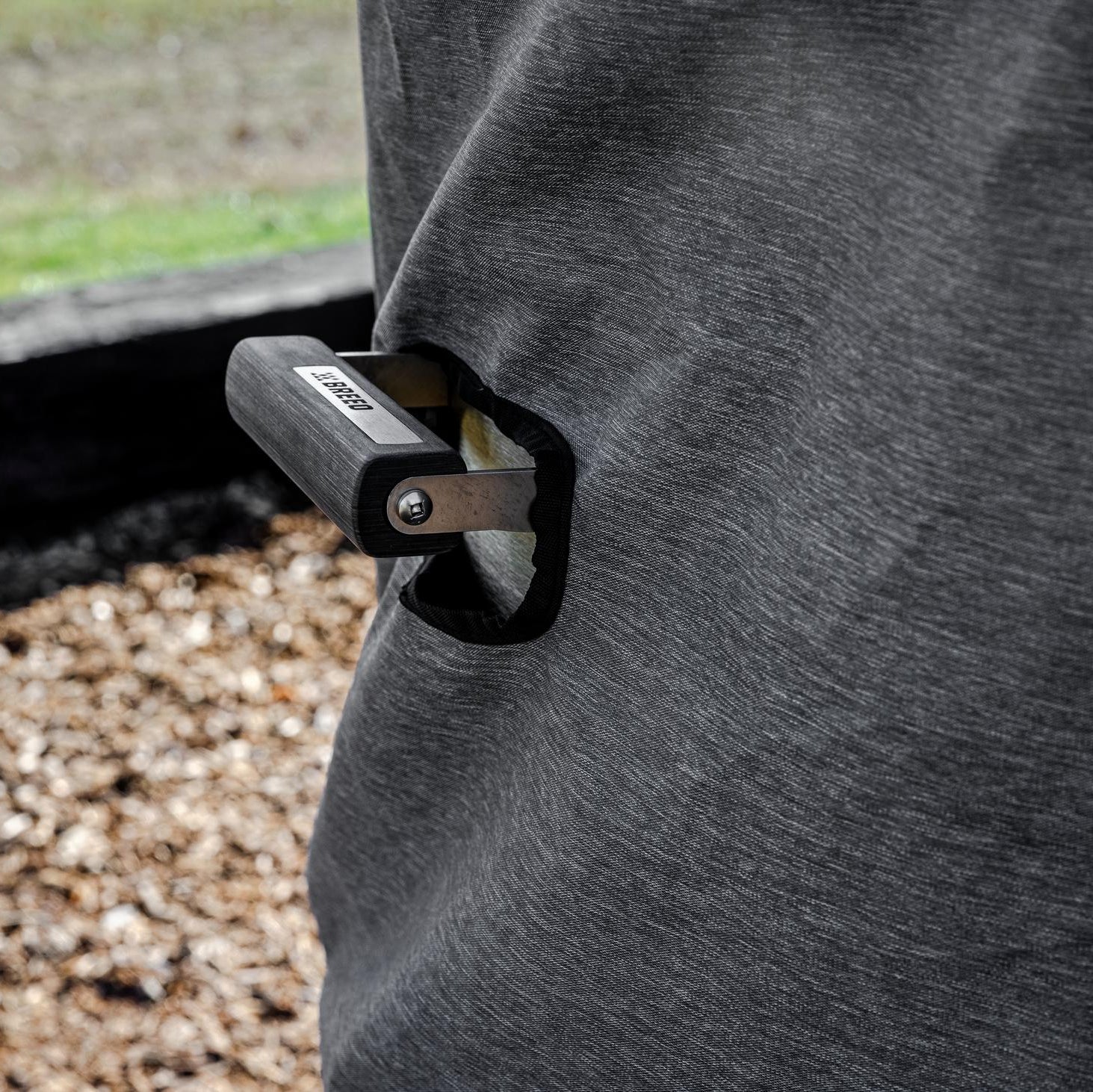 This is an image of the pizza oven cover showing the side opening for the Pizza Oven Handle