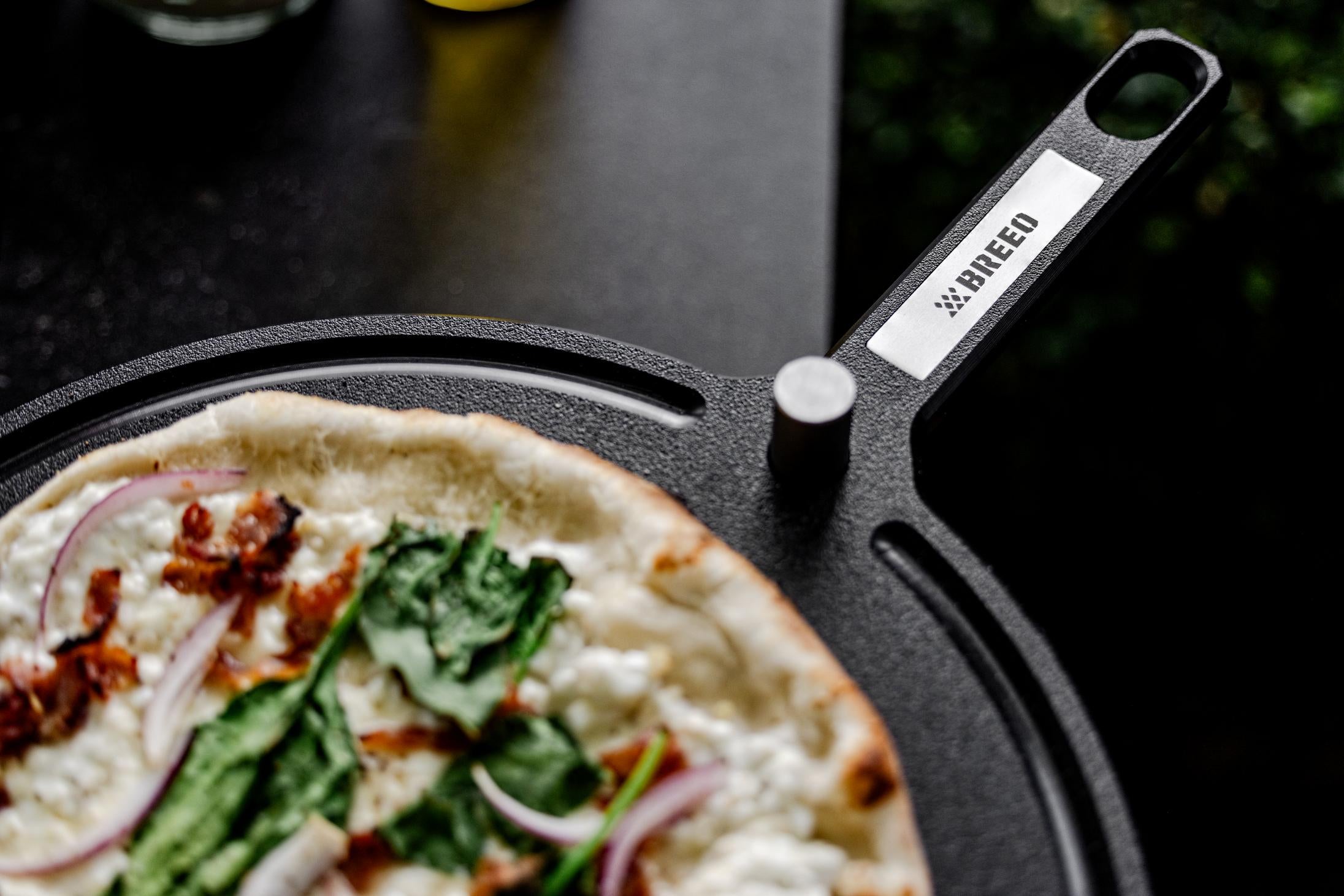 This is an image of the Breeo Serving Board with pizza 