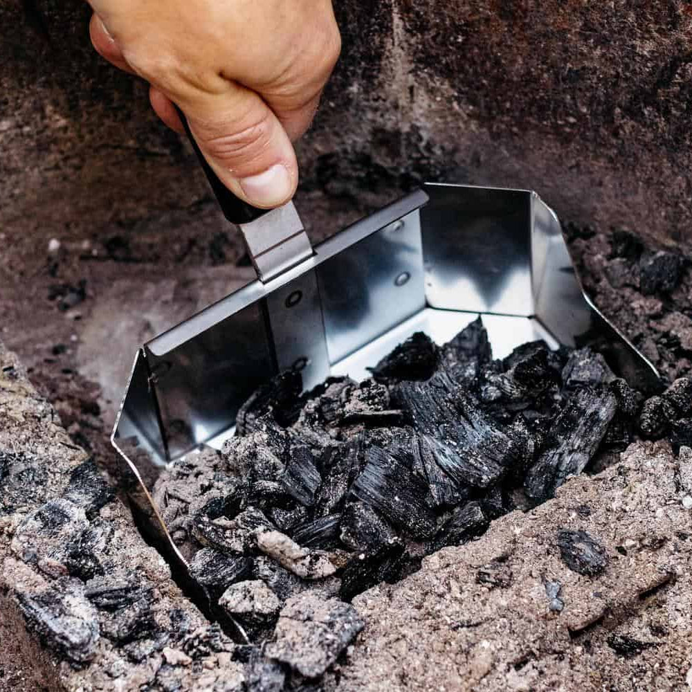 Removing ash with a Breeo Ash Shovel