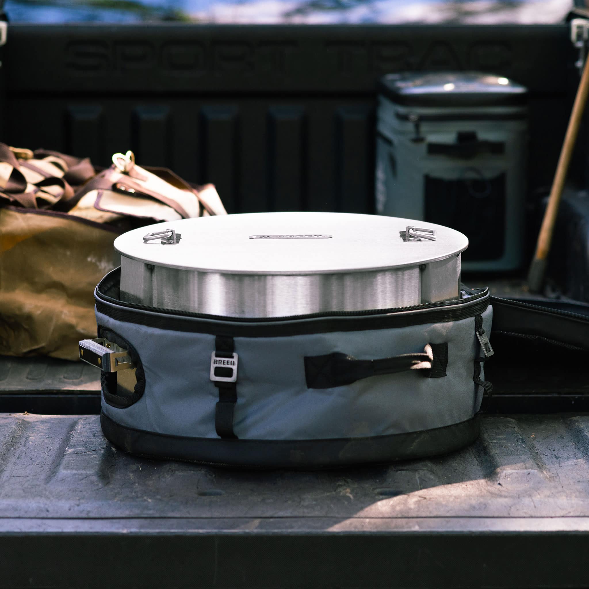 Y Series Firepit and Transit Case on a truck bed. 