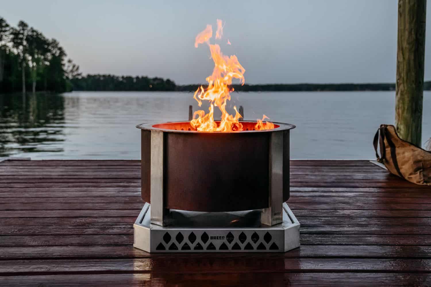 An image of the Breeo Base on a deck with an X Series Firepit 