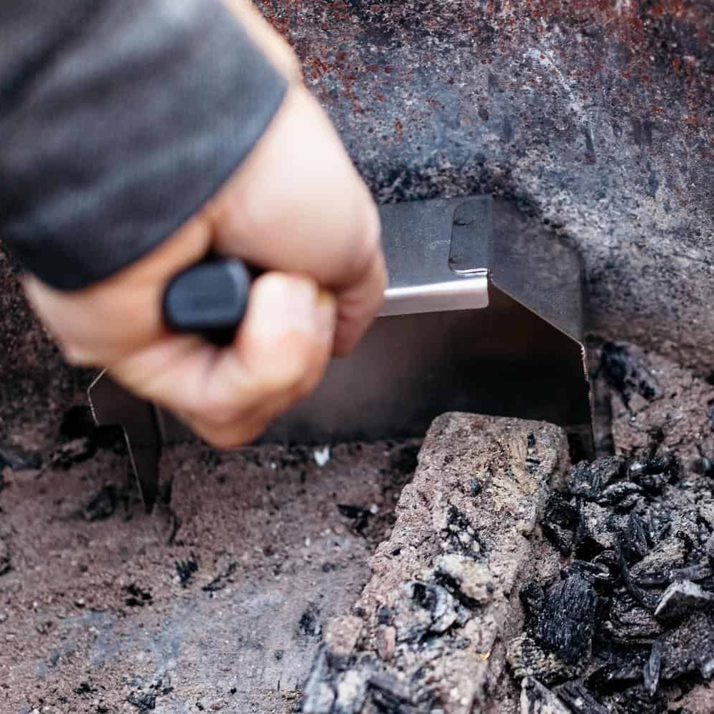 Removing ash with a Breeo Ash Shovel